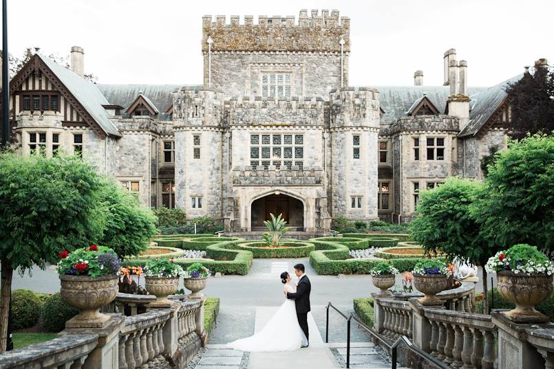 Cherry Wang Wedding Couple in front of Hatley Castle on Vancouver Island