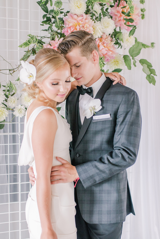 Groom in grey plaid suit by Black and Lee in Vancouver