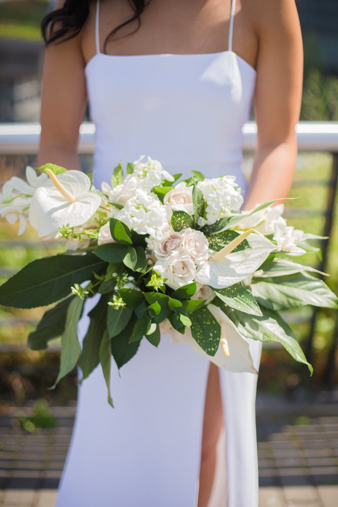 Bridal bouquet with white lilies and greenery