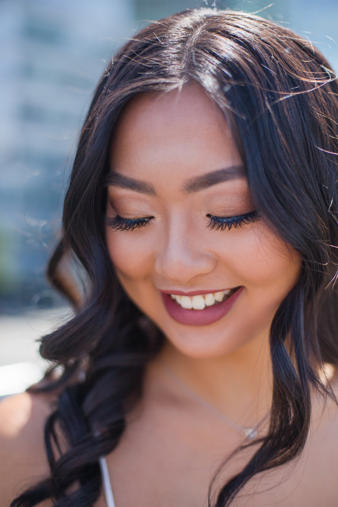 Bride with dark wavy hair and natural makeup by NK Beauty