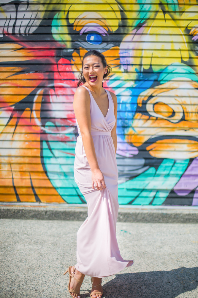 City Chic Bride smiles at the camera in white Park and Fifth Co gown