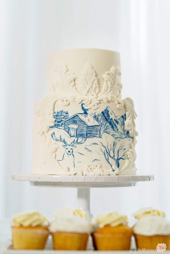 Winter Magic Wedding Cake with blue painting by So Wedding Photography