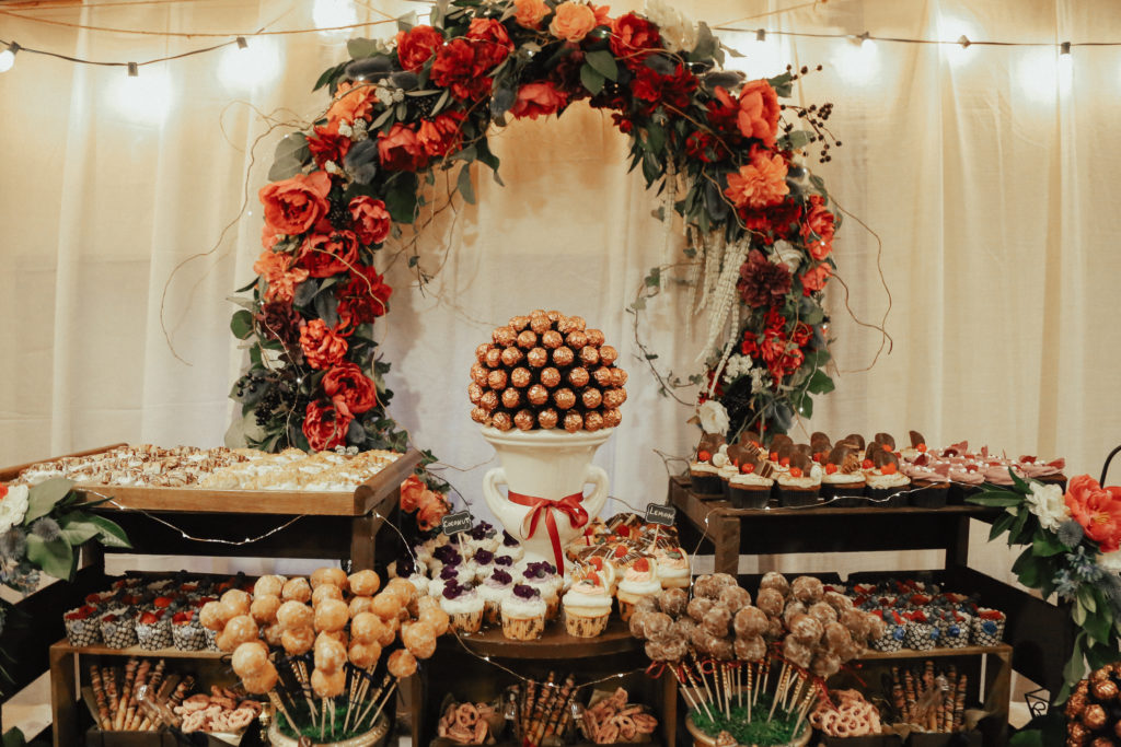 Steal of a Wedding dessert table with cake pops, cookies, chocolates