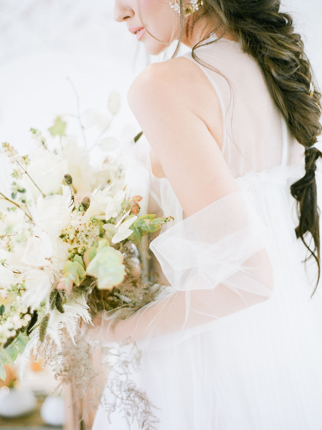 Vera Wang bride holds white bouquet by Simply Sweet Photography Vancouver