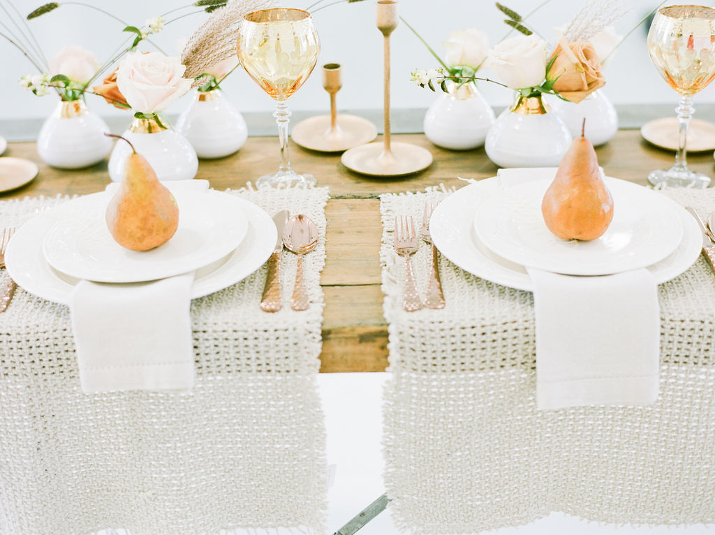 Sweetheart table featuring golden pears, white linens and roses by Deborah Lee Designs Vancouver