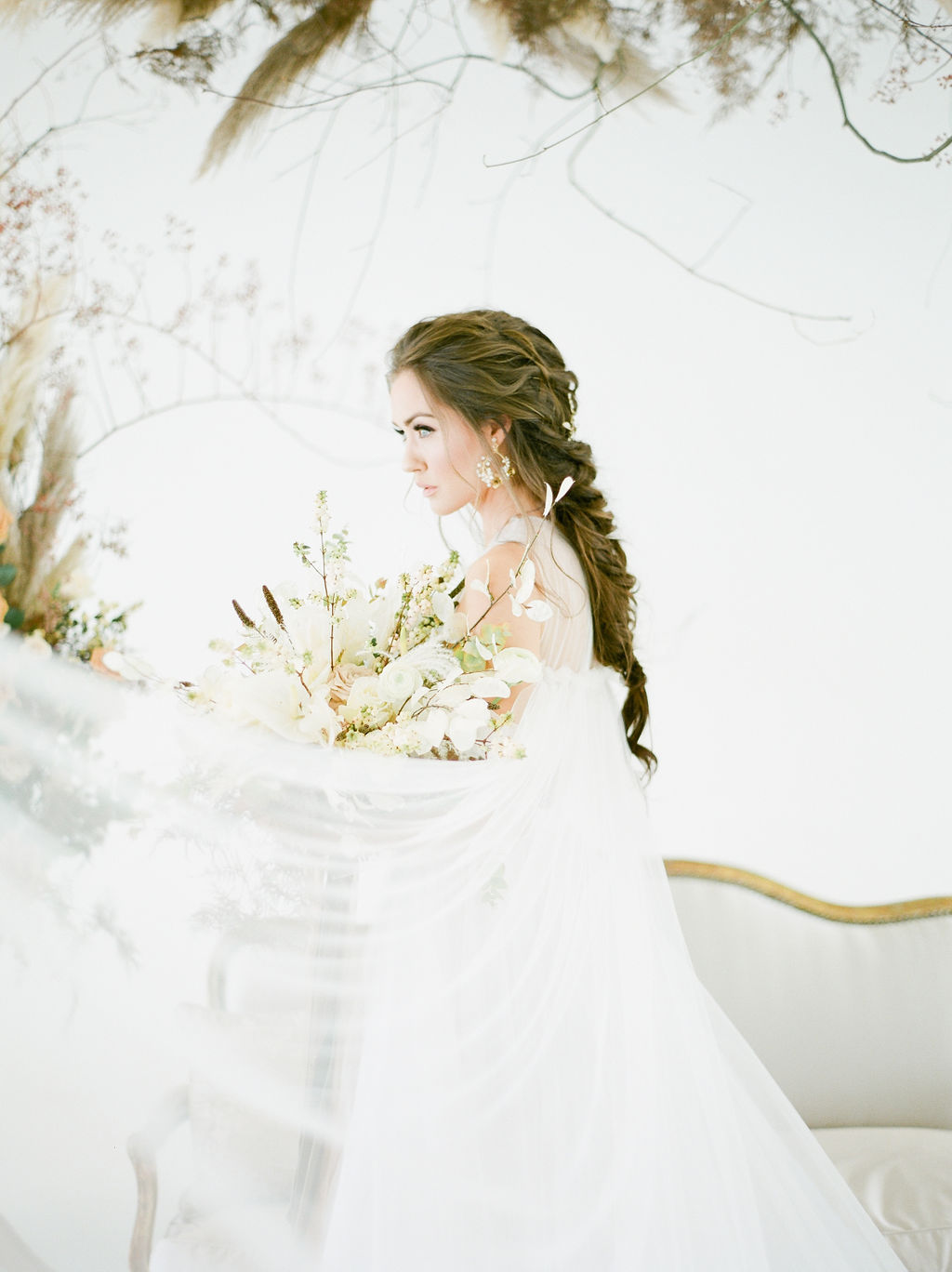 Bride with bridal braid and bouquet at Airside Spaces in Vancouver