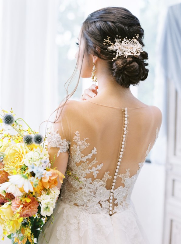 Back of Wedding Gown with Button by Niki Xie Photography Vancouver