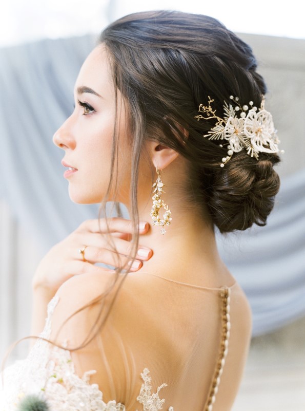 Bride with hair jewelery in swept up do with earrings by Momo Liu Makeup Vancouver