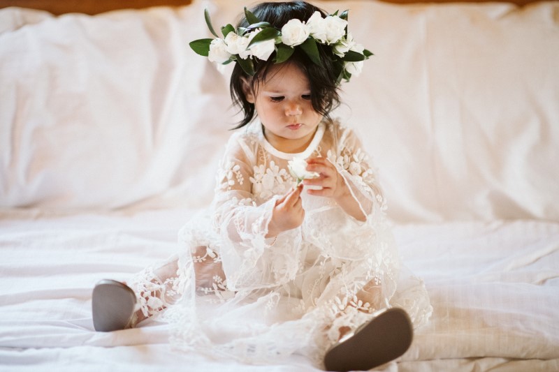 Wedding in the Woods flower girl with white rose head wreath by Erin Wallis Photography