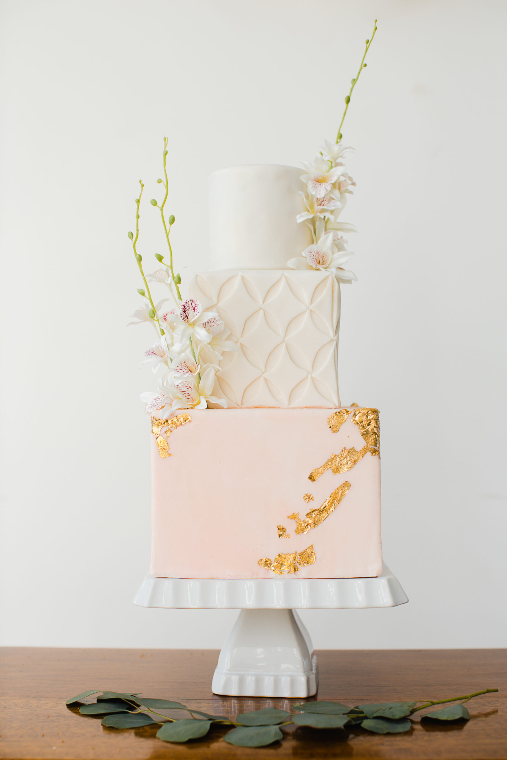 Peach and White Stacked Cake with Gold Emblossing and White Flowers by Schur to Please Vancouver Island