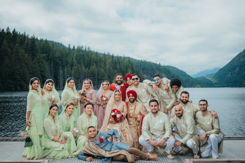 Coastal Luxury Indian Wedding party on lake dock by West Coast Weddings Magazine 