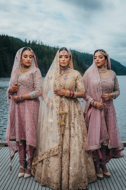 Indian Bride and Bridesmaids in Blush Sarees by Pristine Allure Studio