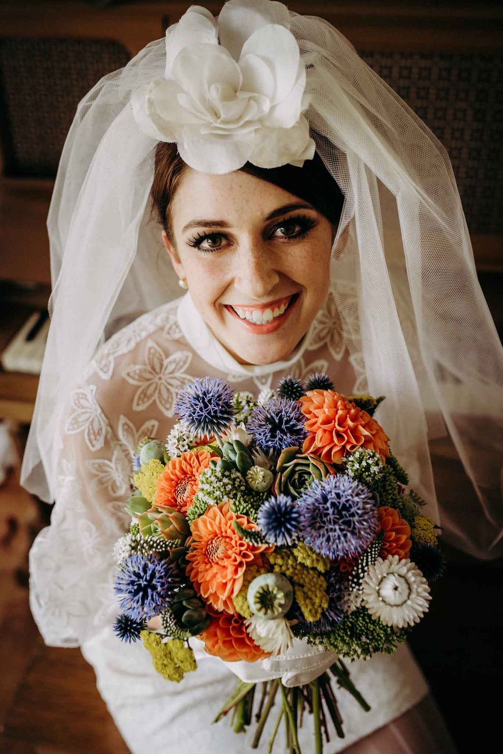 Vintage Bride Holds Smokey Blue and Orange Brides Bouquet by Little Bee Blooms