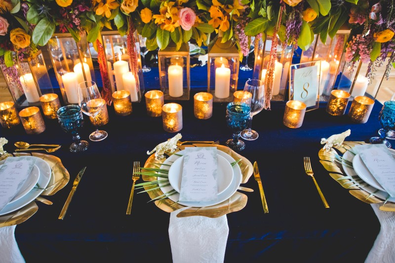 Royal Blue and Orange Wedding Table Setting Photographed by Dragonflight Photography