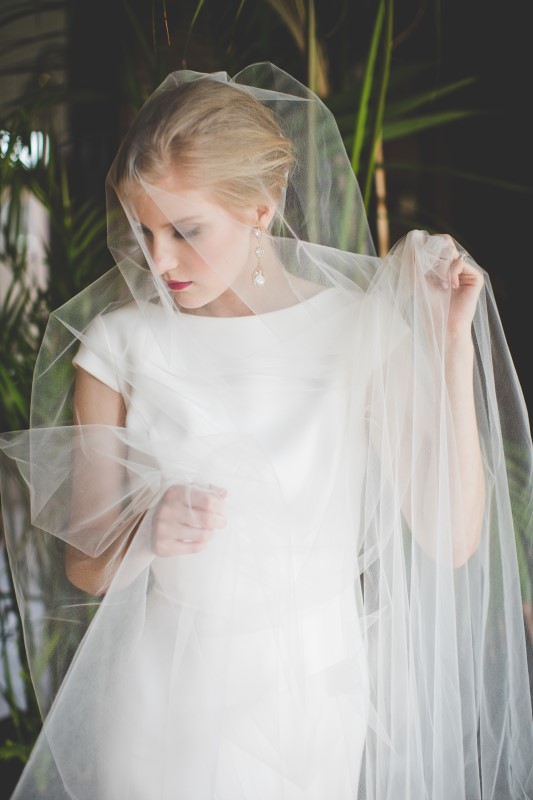 Bride covered in veil at The Fairmont Empress by Dragonflight PHotography