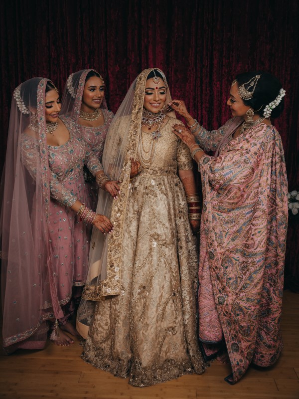 Flawless Bridal Fusion Indian Bride with mother and bridesmaids by Vivah Collection