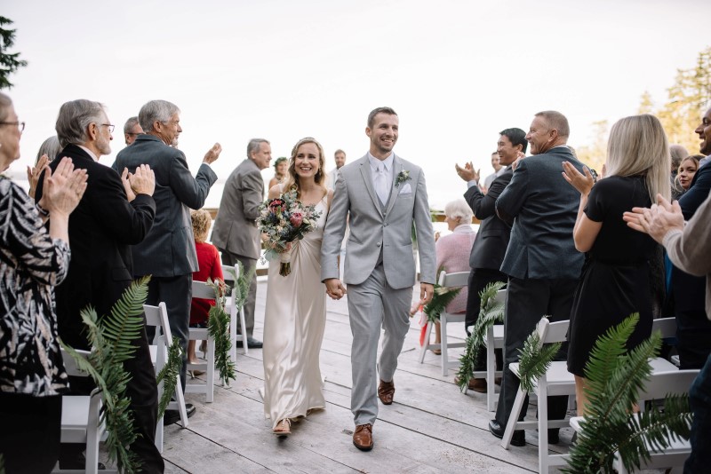 Seaside Romance Wedding Couple Leaving Ceremony at Telegraph Cove on Vancouver Island