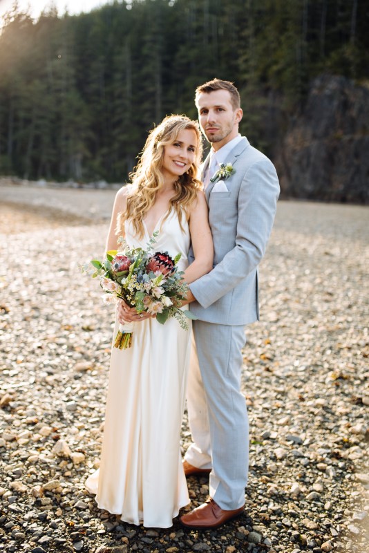 Newlyweds Pose on Vancouver Island, Bridal Gown by The White Peony