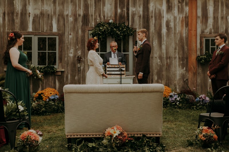 Charming Farm Wedding Vows as bride and groom stand at Bilston Creek Farm