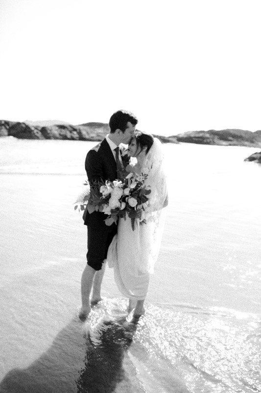 Black and White Wedding Beach Kiss Sabrina Patrice Photography