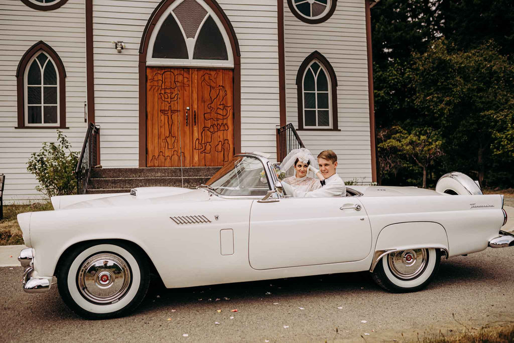 Vintage 60's Wedding Couple in Vintage Car in front of tiny church on Vancouver Island