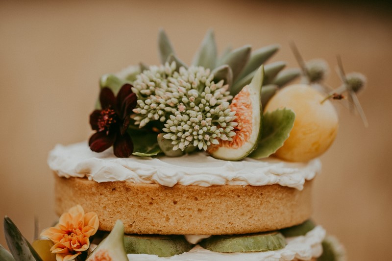 Naked Wedding Cake with Fruit by Cobble Hill Cake Co.