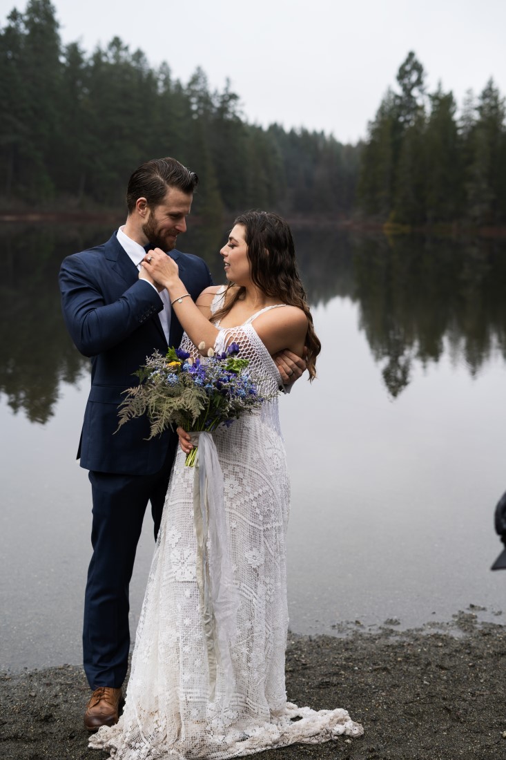 Eloping couple by lake by Brittany Carey Photography