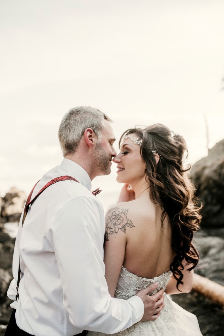 Bride and Groom on oceanfront in Ucluelet by Jen McLeod Photography