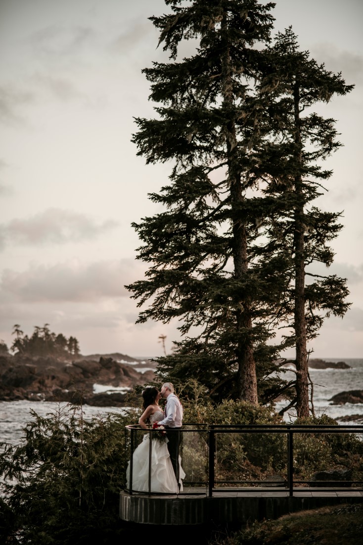 Ucluelet Oceanside Wedding Iconic Walkway Shot of Bride and Groom at Black Rock Oceanfront Resort Jen McLeod Photography