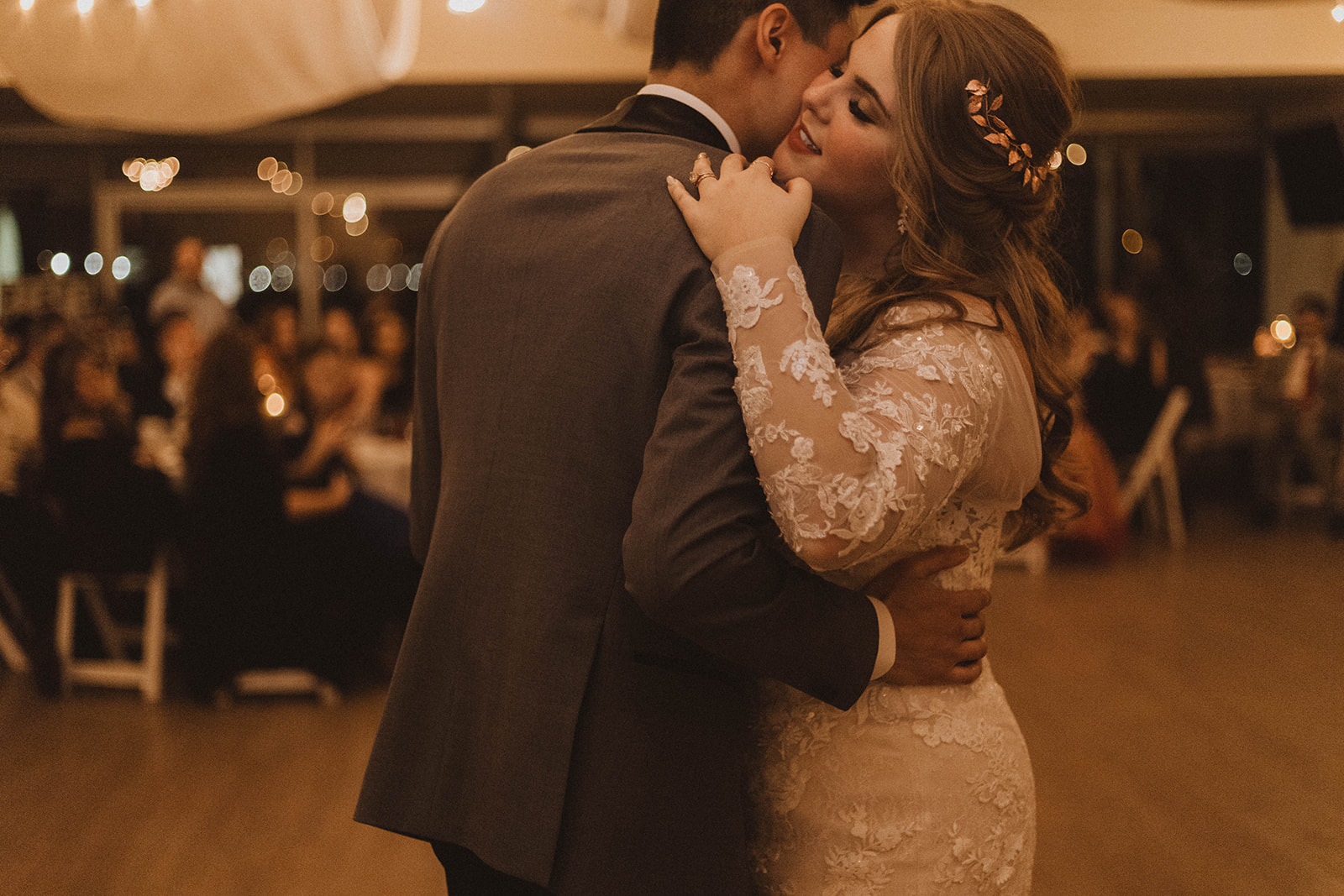 UBC Newlyweds first dance surrounded by lights and guests in Vancouver