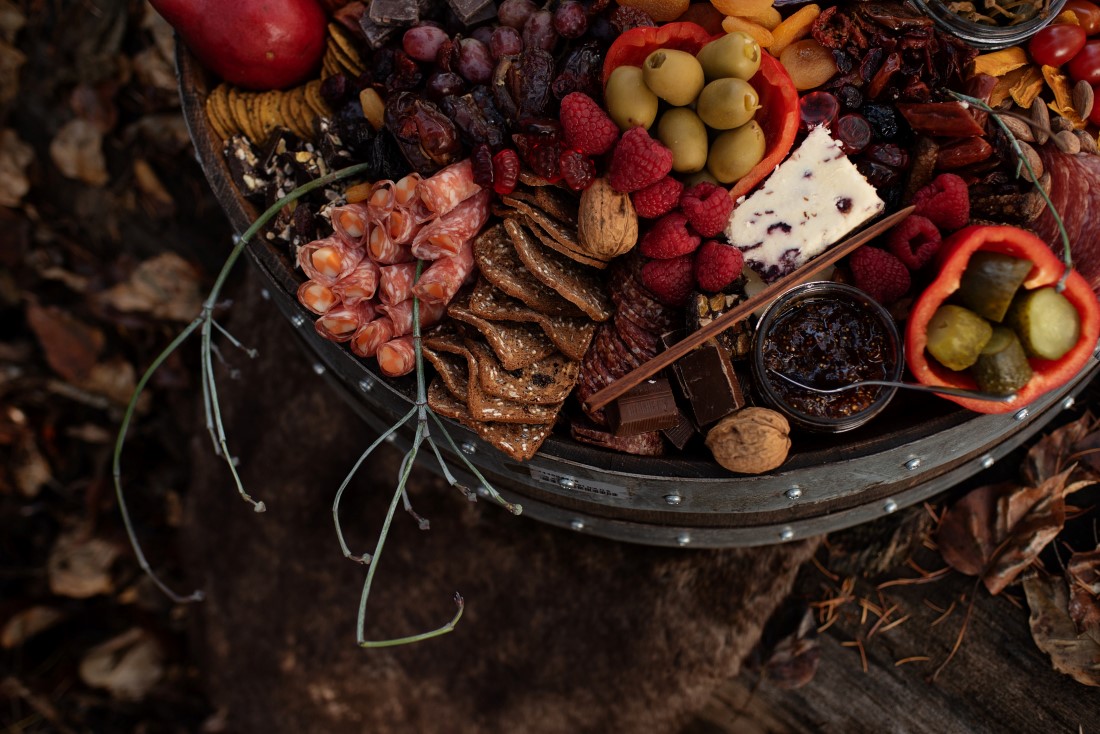 Charcuterie with pine cones for wedding reception table by The Charcuterie Bear Vancouver