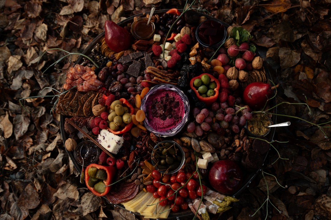 Charcuterie board in rich autumn colors and fruit by The Charcuterie Bear Vancouver