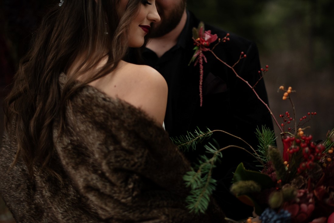 Bride wearing brown stole over white wedding gown by The Dressy Attic Vancouver