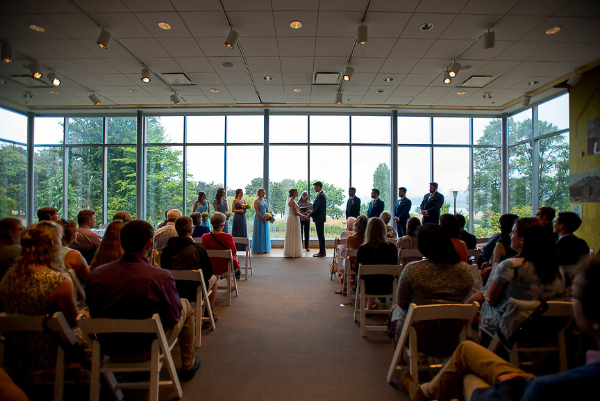 Vancouver Museum wedding ceremony in front of bank of windows