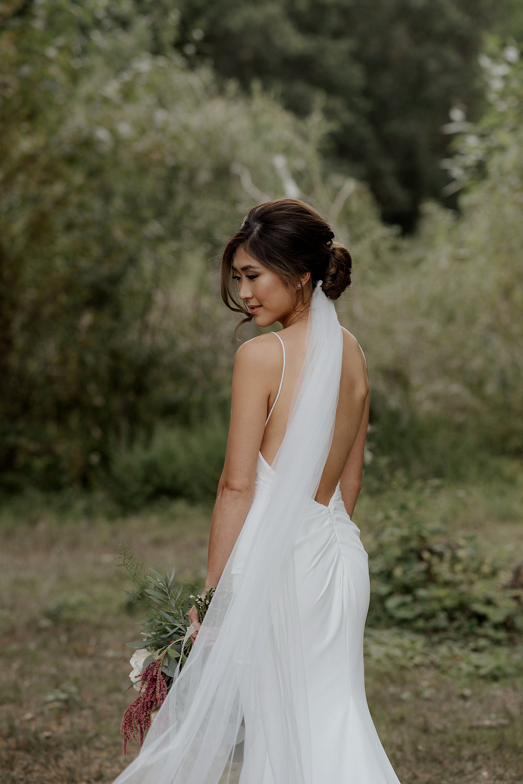 Beautiful Bride in long veil and Hair by Clara Leung