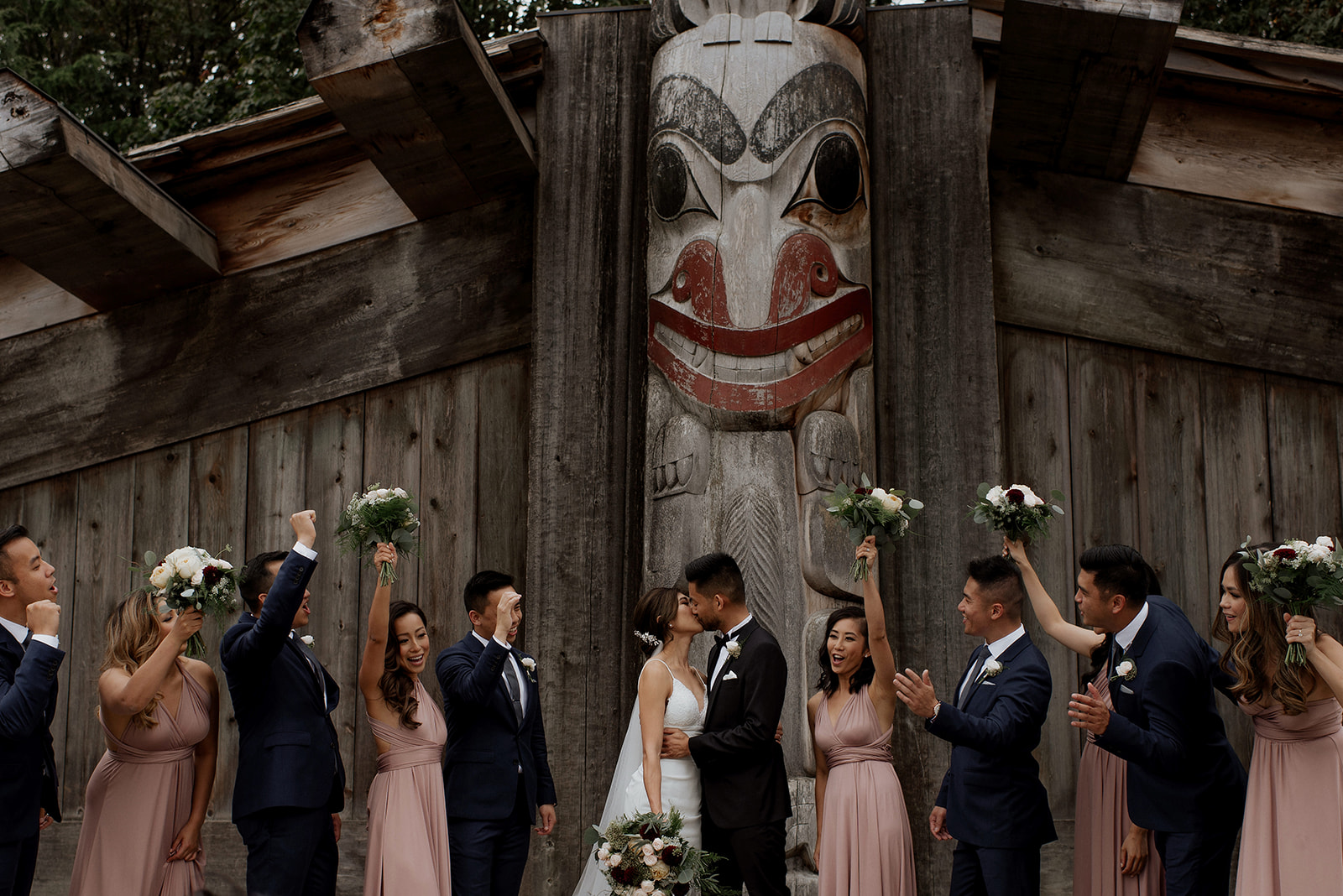 UBC Rose Garden Wedding Party in front of Native Indian totem pole