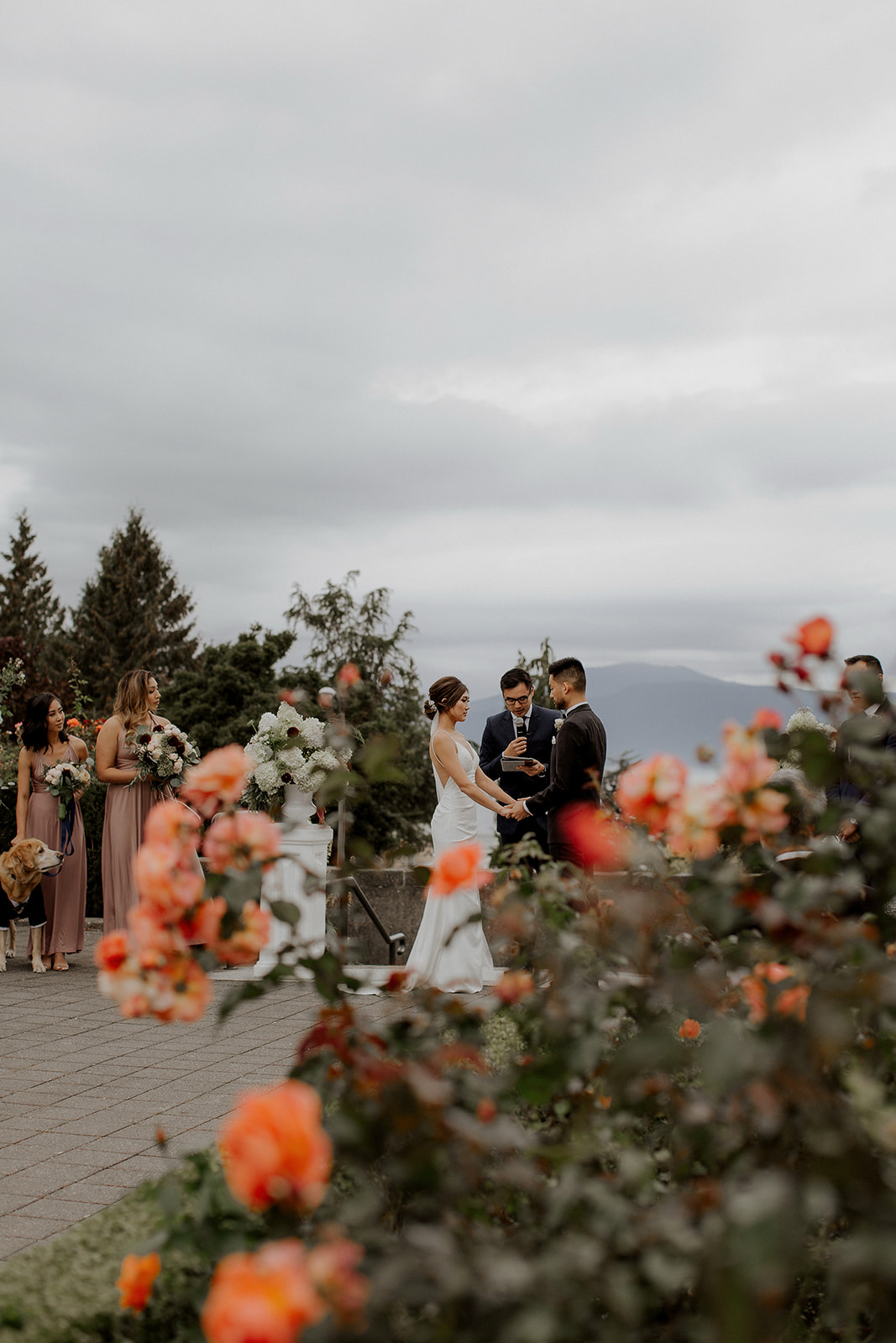 UBC Rose Garden Couple recite wedding vows in Vancouver by Elle Weddings