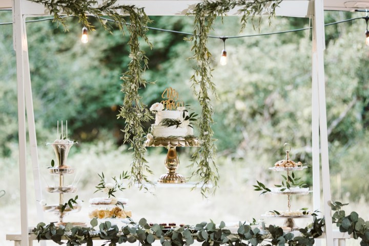 Wedding Cake under greenery by Truffles Catering Vancouver Island