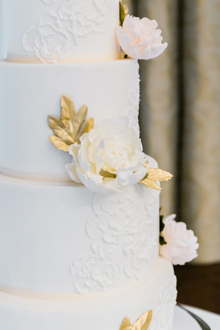 Wedding Cake with peach and white flowers by Neet's Treats Vancouver