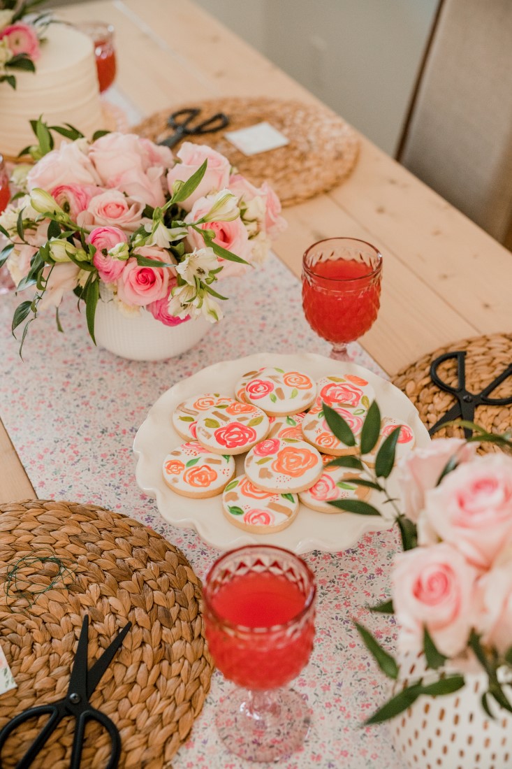 DIY Floral Crown Workshop Bridal Shower table with cookies, wine and flowers