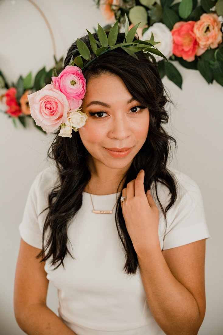 Bride wearing floral crown at her bridal shower