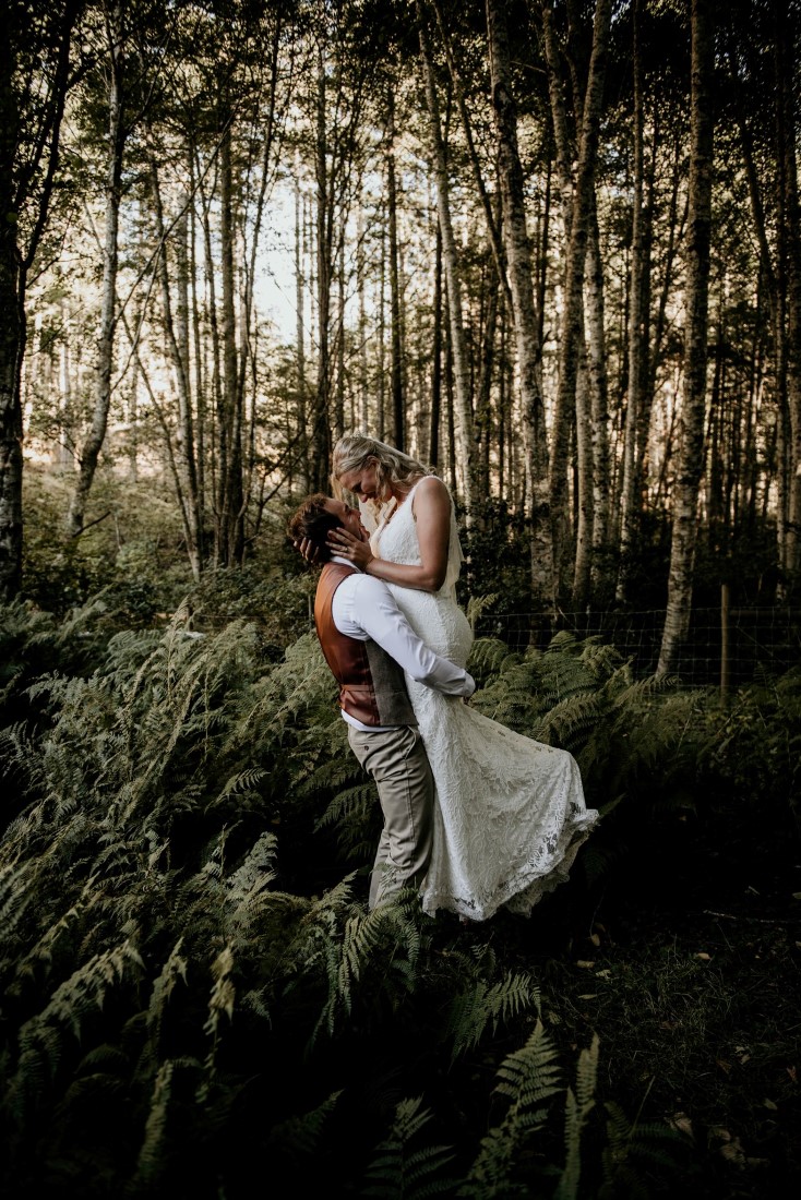 Newlyweds in Vancouver Island forest by Coastline Living Photography