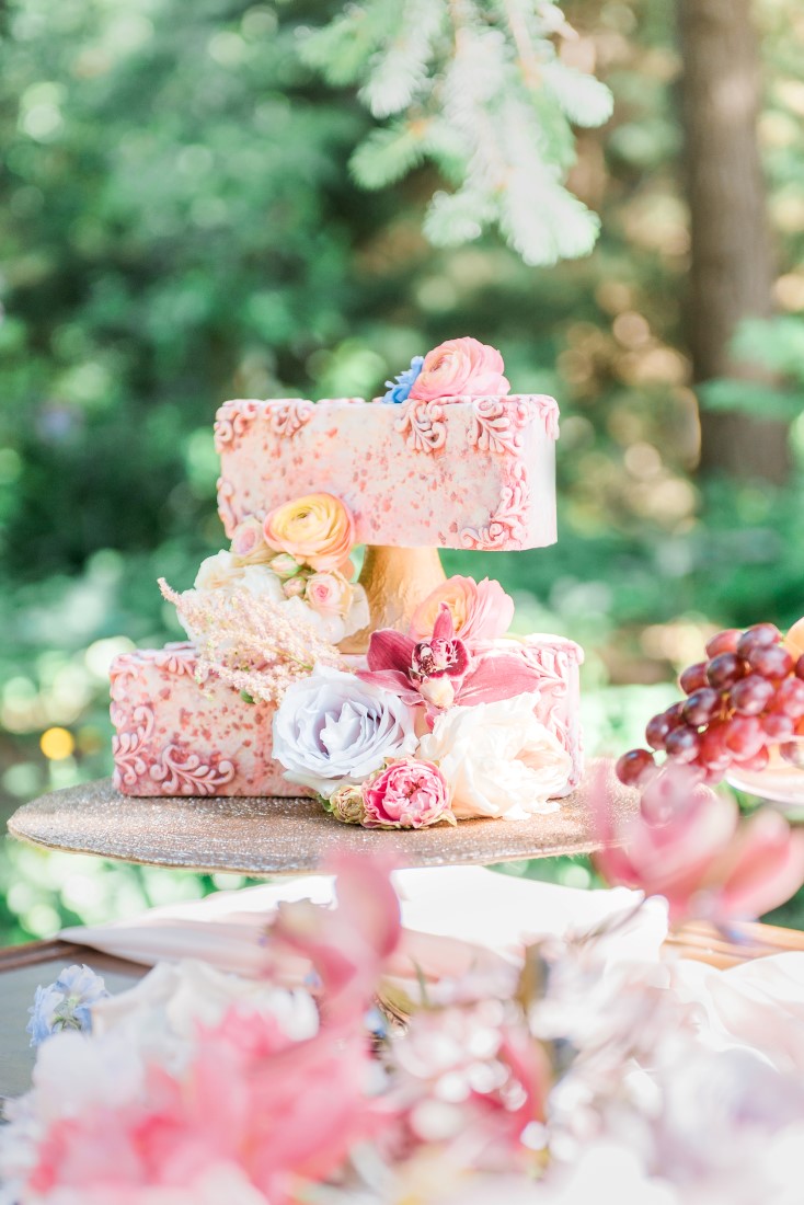 Blush pink wedding cake on gold cake stand by Capital City Cakes Vancouver