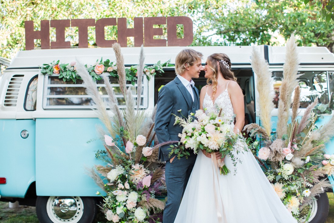 Hitched sign on top of Volkswagen van van