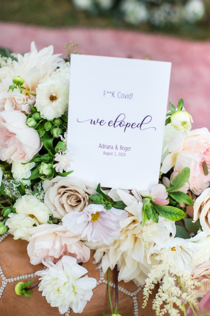 We eloped sign in floral arrangement by Vancouver Flowers