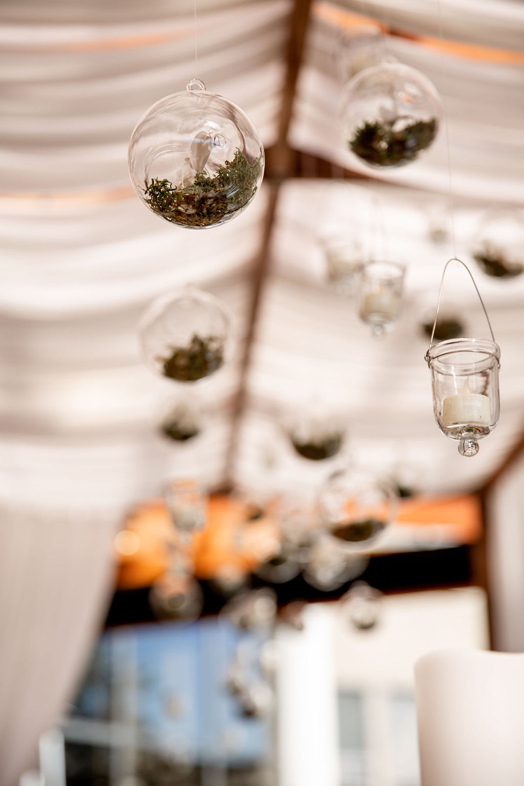 Glass bubble float above wedding table at Pacific Gateway Hotel Vancouver