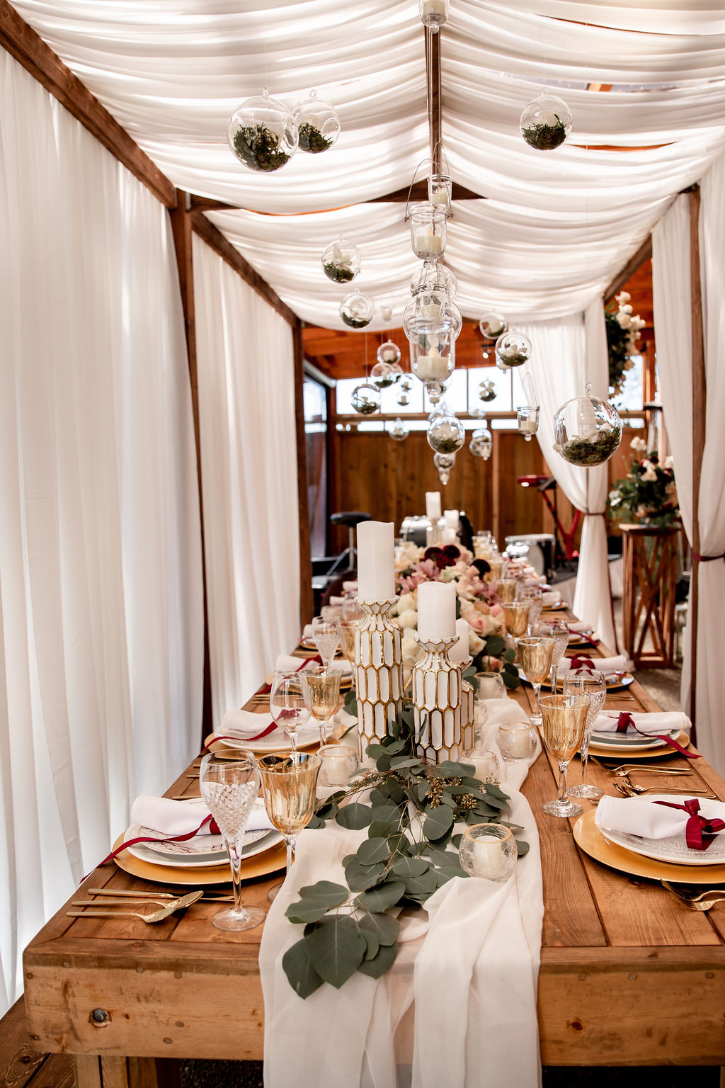 Trestle table with white curtains for wedding reception by Ellssi Vancouver