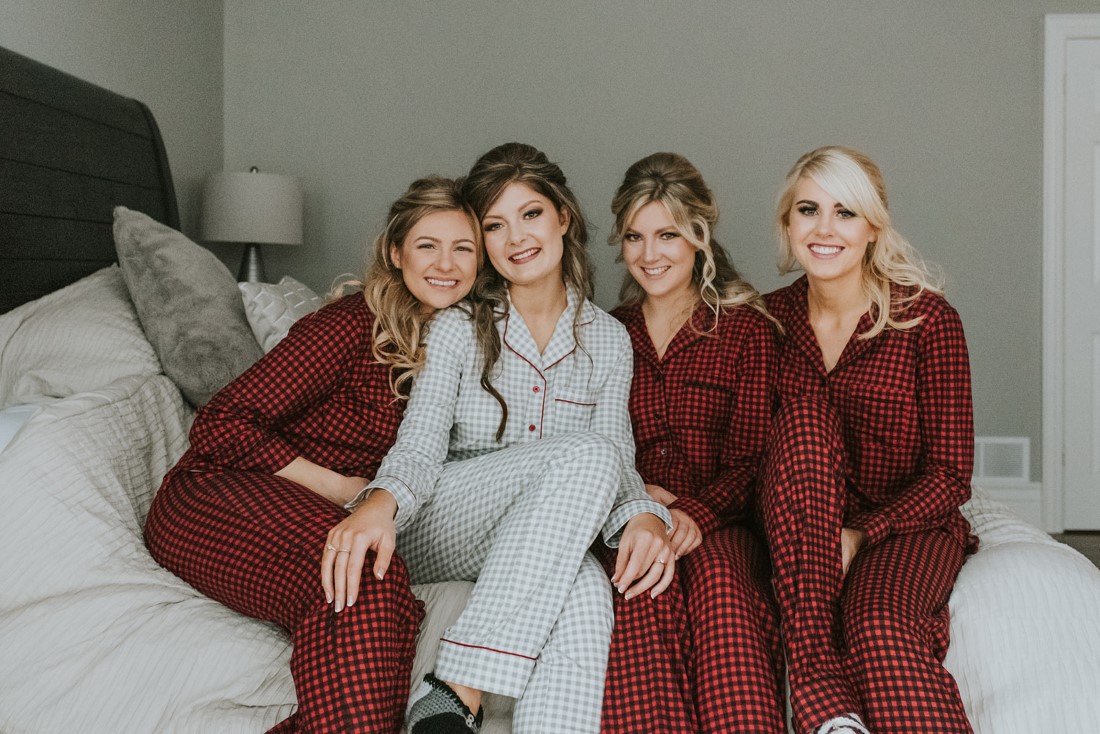 Bride and Bridesmaids in red and grey flannel pajamas