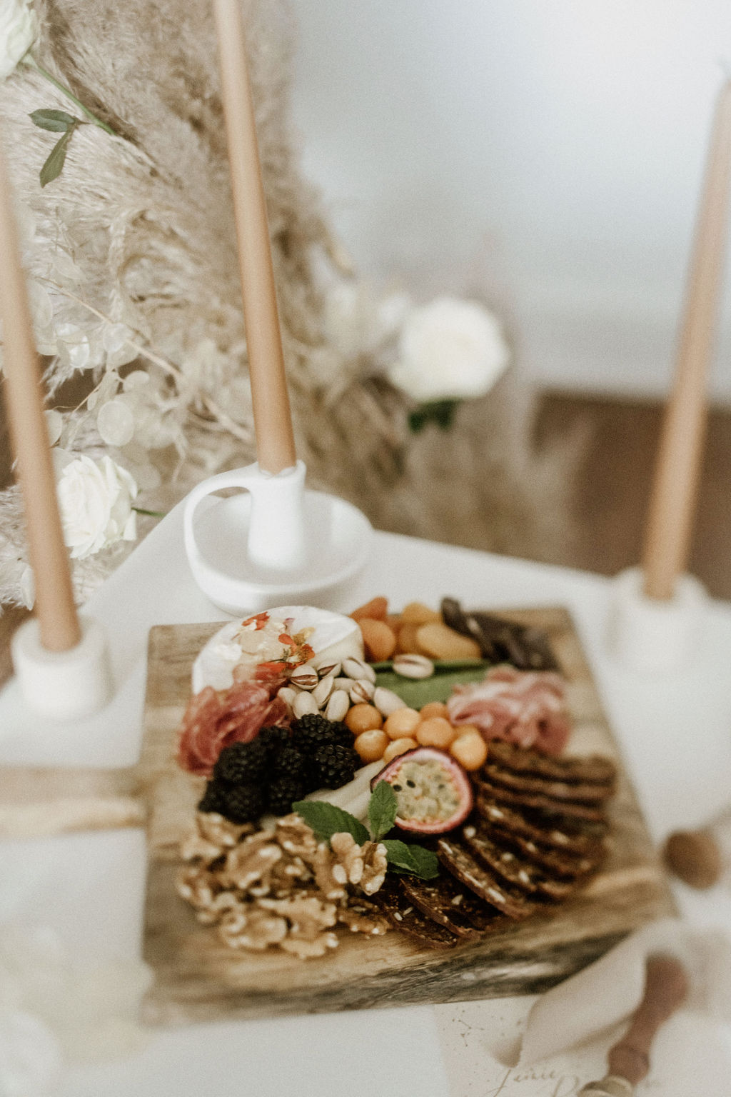 Gorgeous charcuterie platter on wedding table by Miel Snack Platters Vancouver