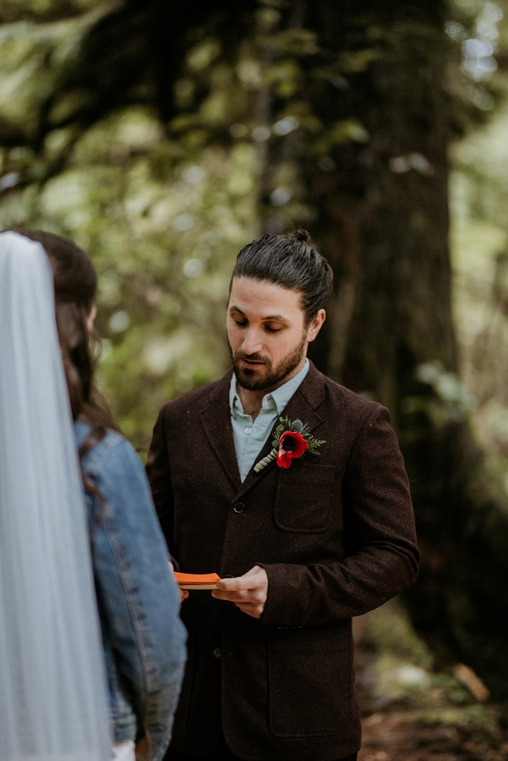 Groom shares wedding vows in Tofino forest 